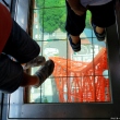 Walking on transparent floor at Tokyo Tower