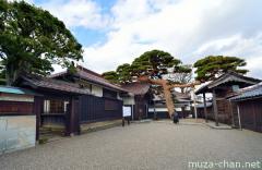 Gate covered pine of the Honma residence