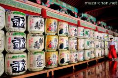 Miko and sake barrels at Toshougu Shrine
