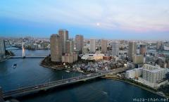Moon rising over Tsukishima, wide-angle bird's-eye view