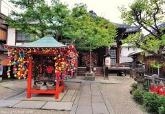 Japanese traditions, colorful Kukurizaru hanging monkeys